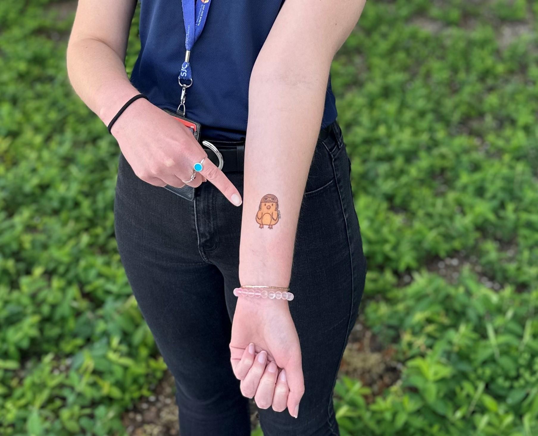 Close up Kayla with SJC tattoo